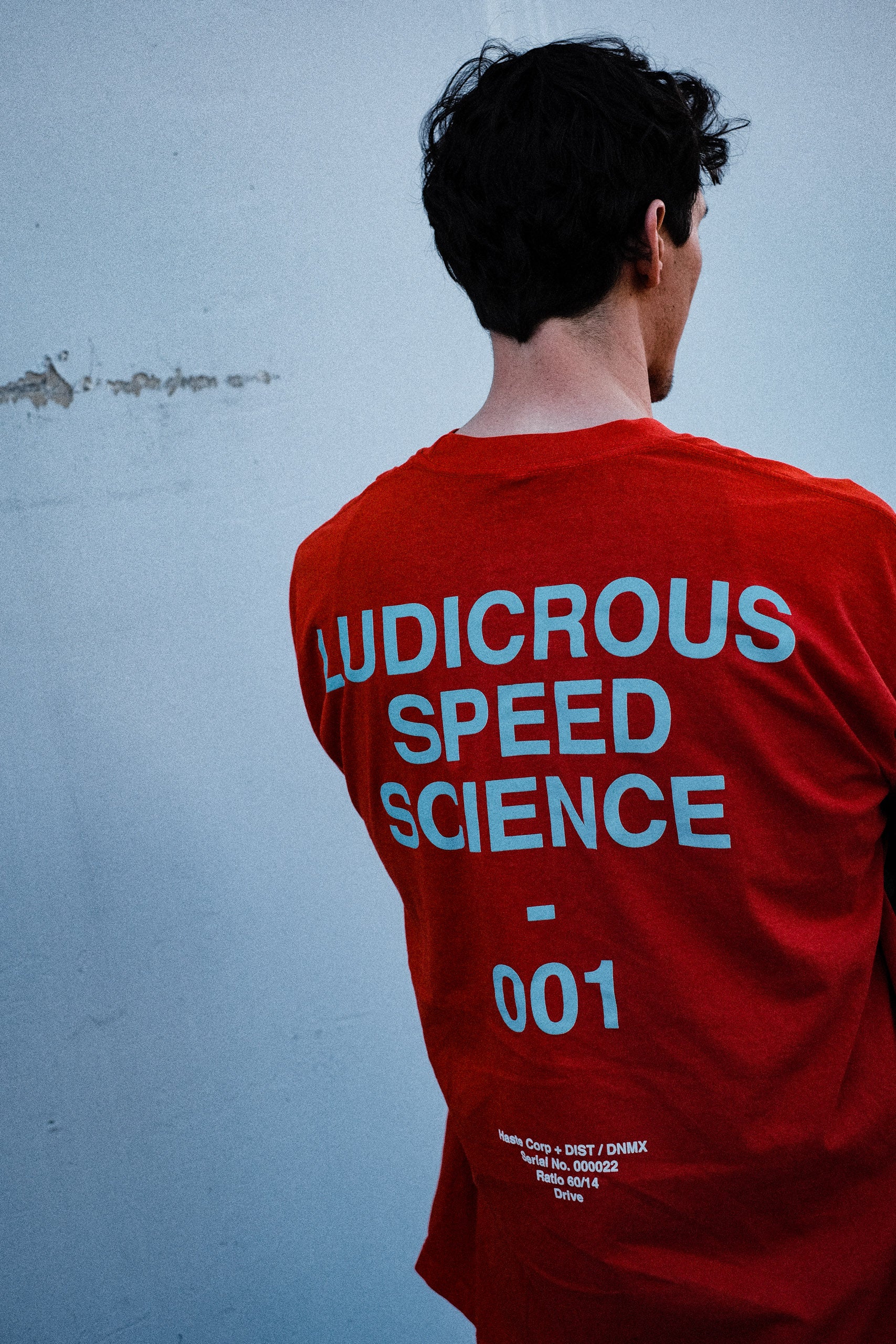 HASTE x DIST / DNMX "LSS" T - HYPER ORANGE