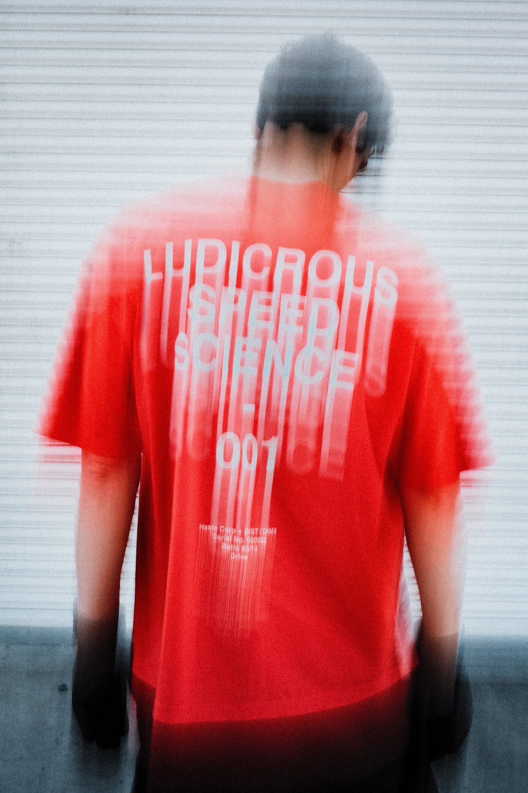 HASTE x DIST / DNMX "LSS" T - HYPER ORANGE