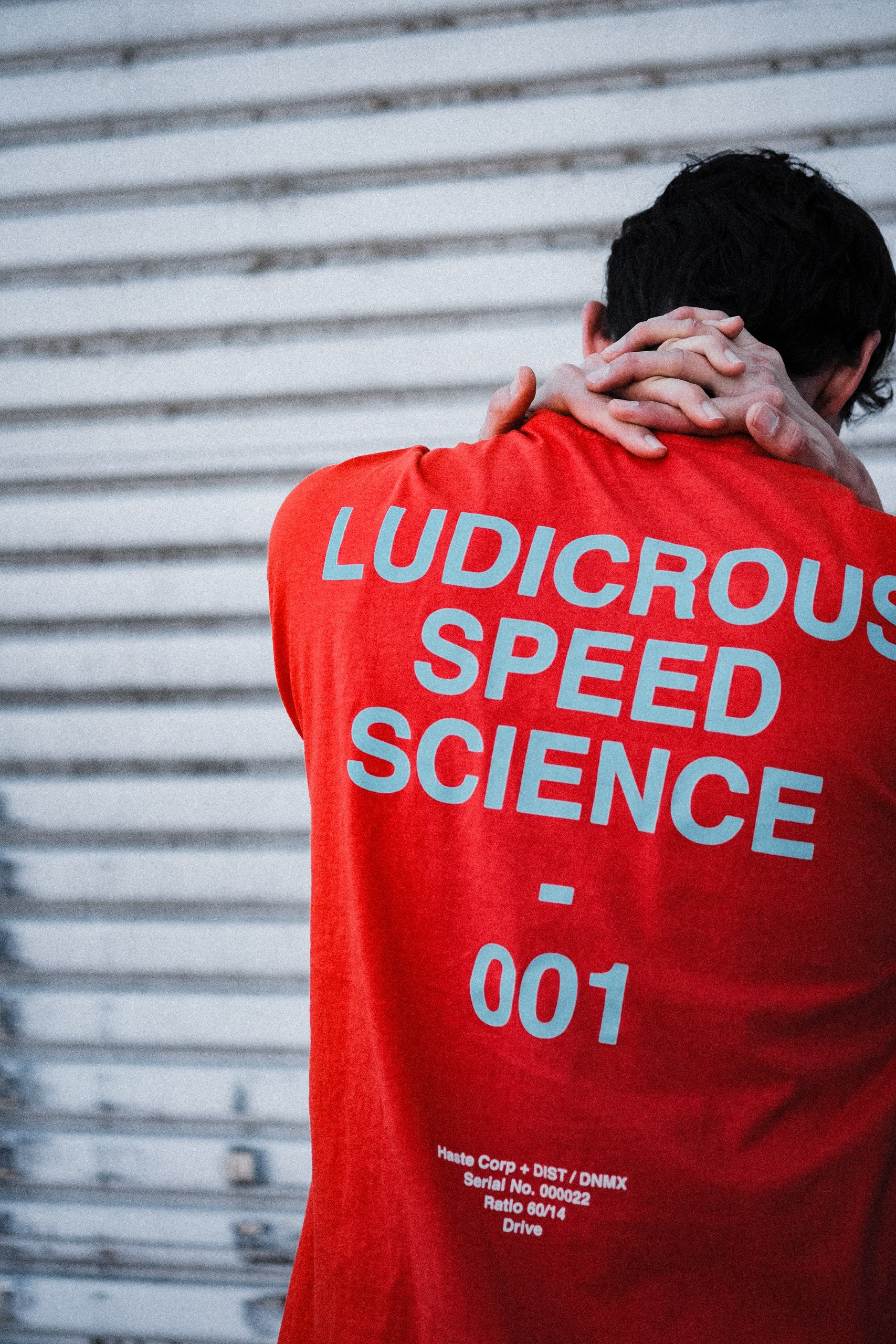 HASTE x DIST / DNMX "LSS" T - HYPER ORANGE